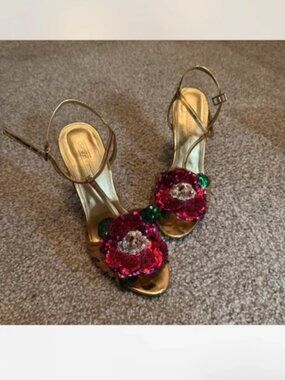 Gold heels with floral decor